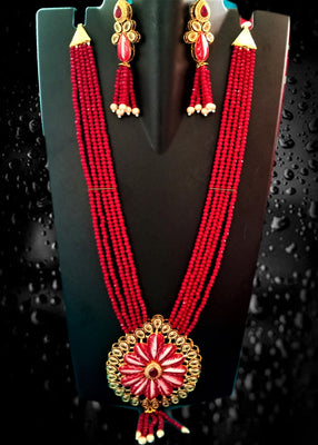 N0121_Classy Grand Crystal necklace set with a grand pendant  studded with stones and with delicate craft work.